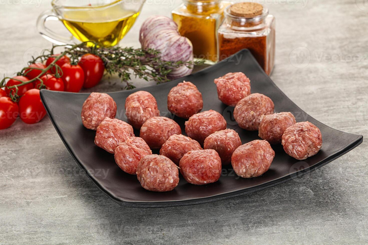 Uncooked raw beef meatball minced photo