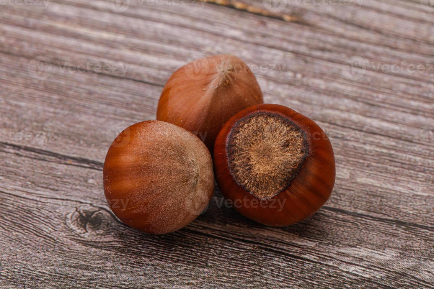 Hazelnut heap isolated over background photo