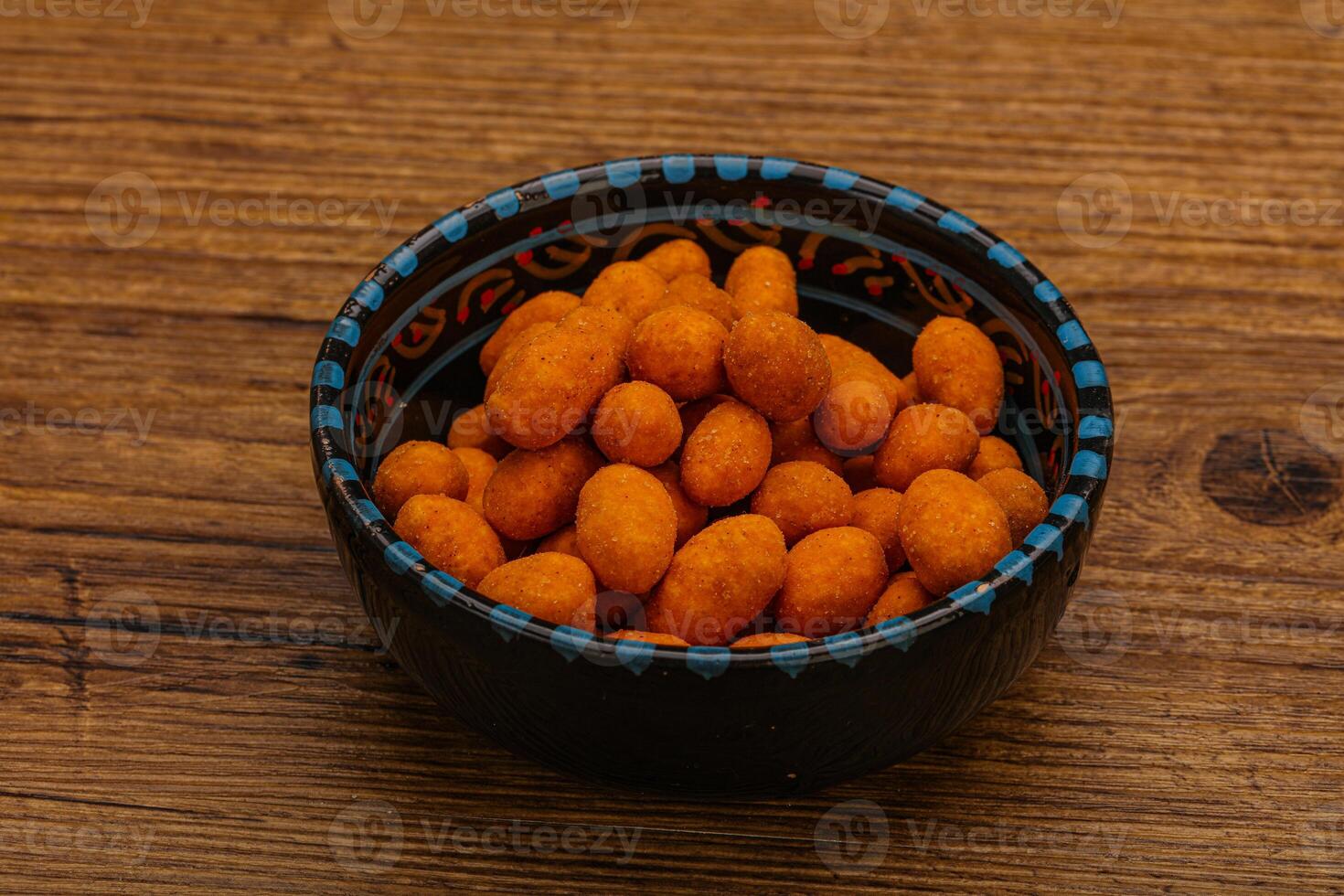 Spicy peanut heap in the bowl photo