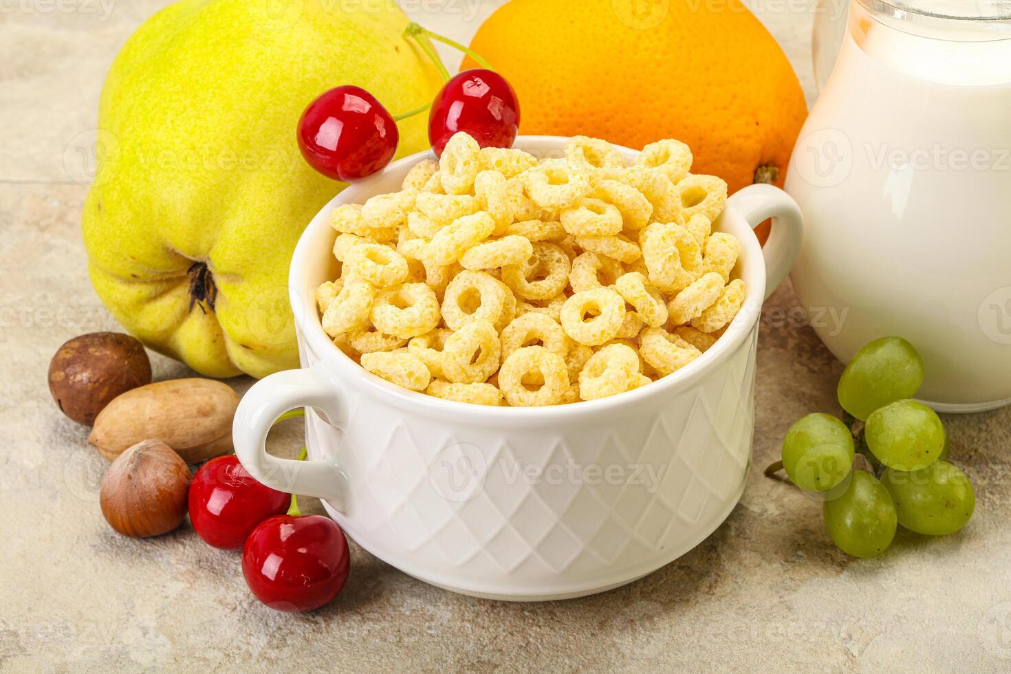 Breakfast with corn rings and milk photo