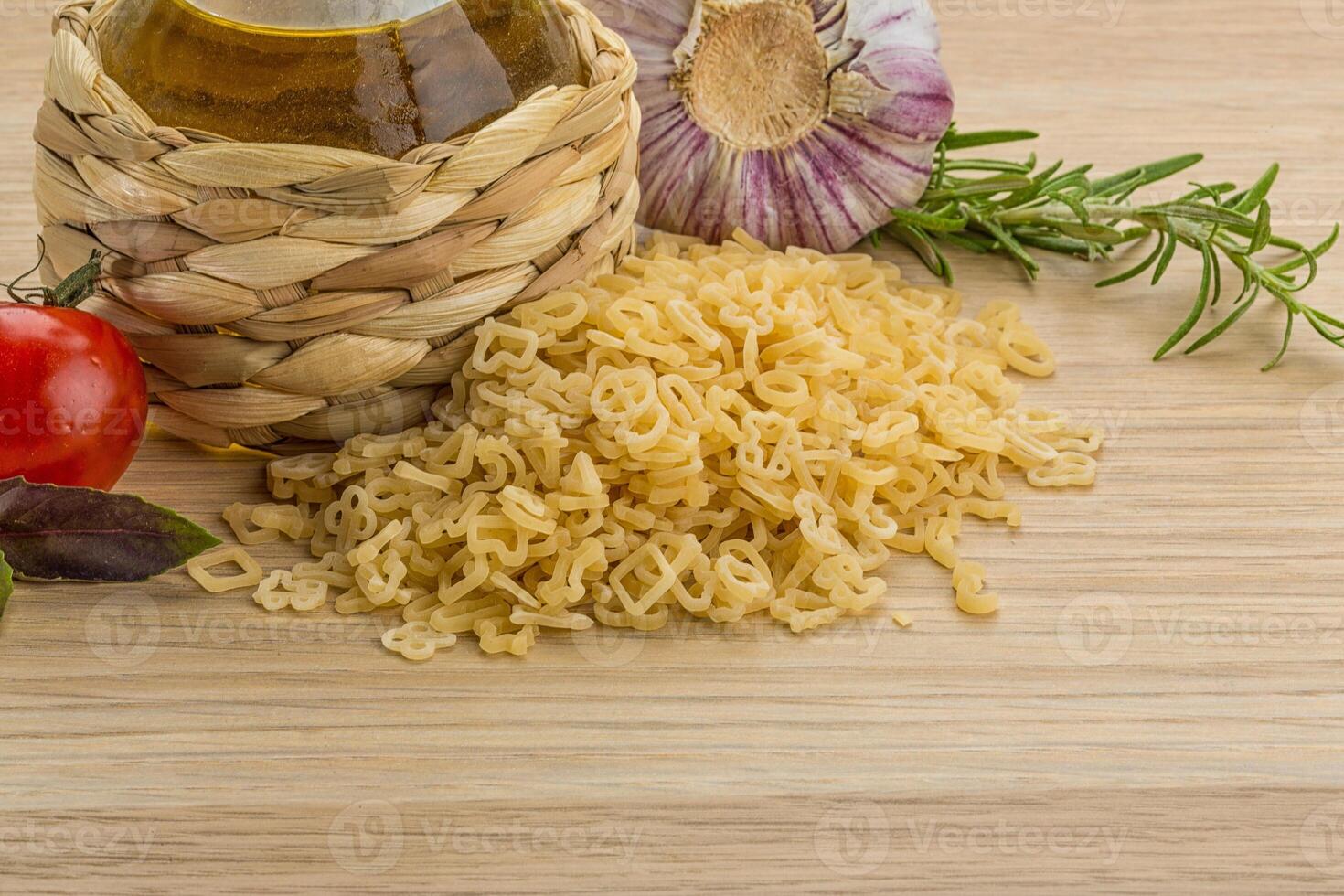 Kids pasta over board photo