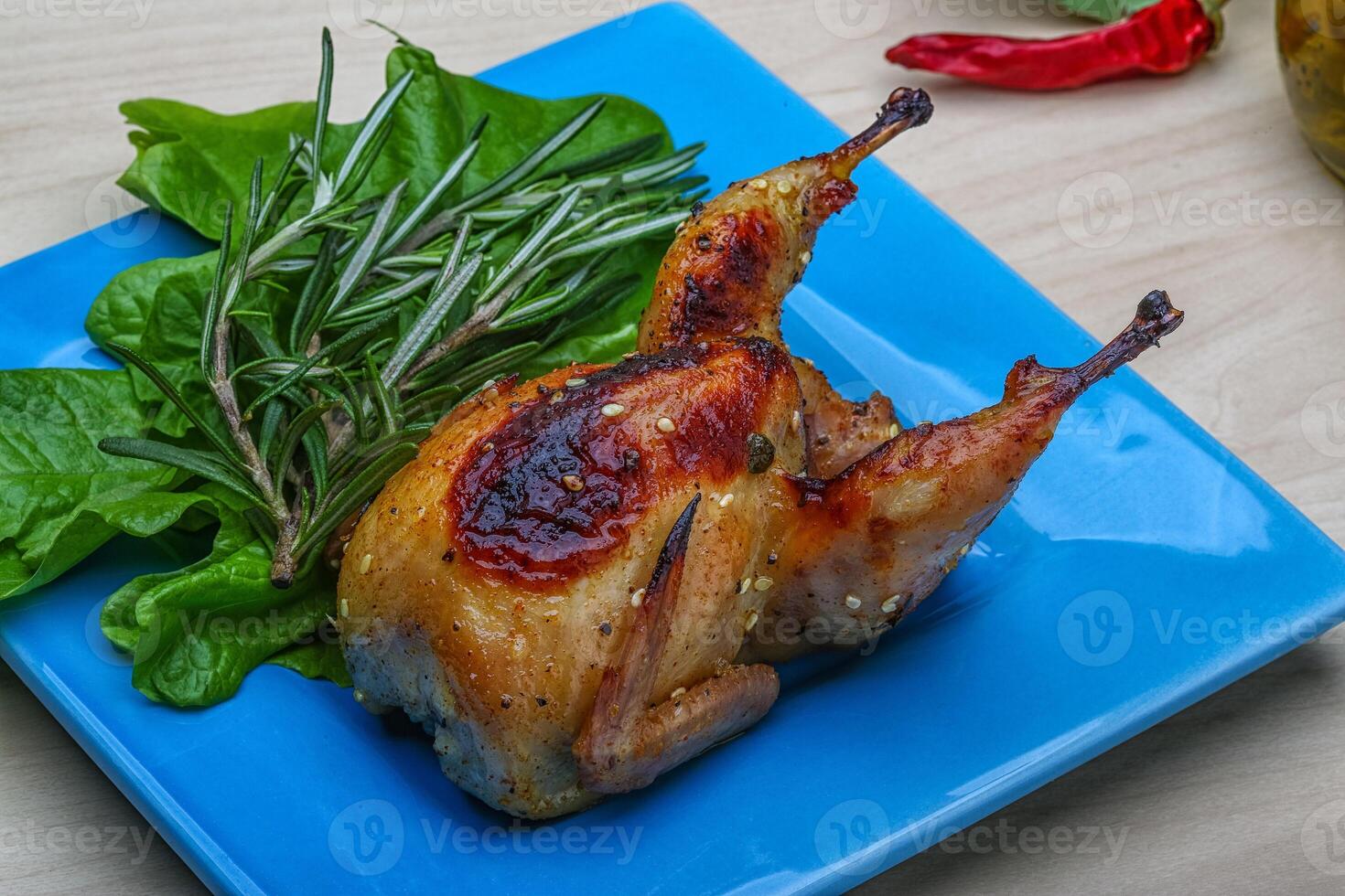 Roasted Quail in the plate photo