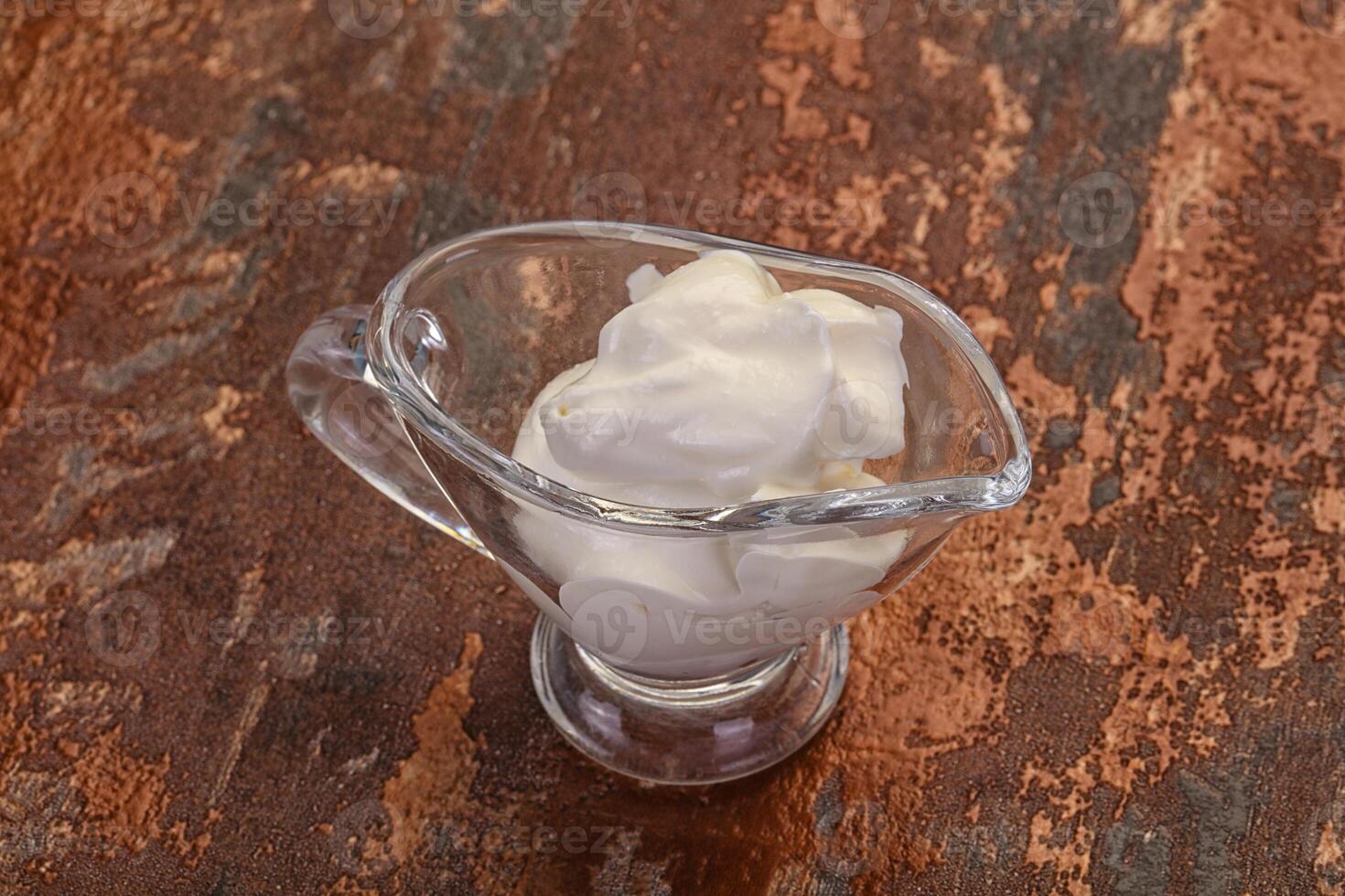 Sour cream in the bowl photo