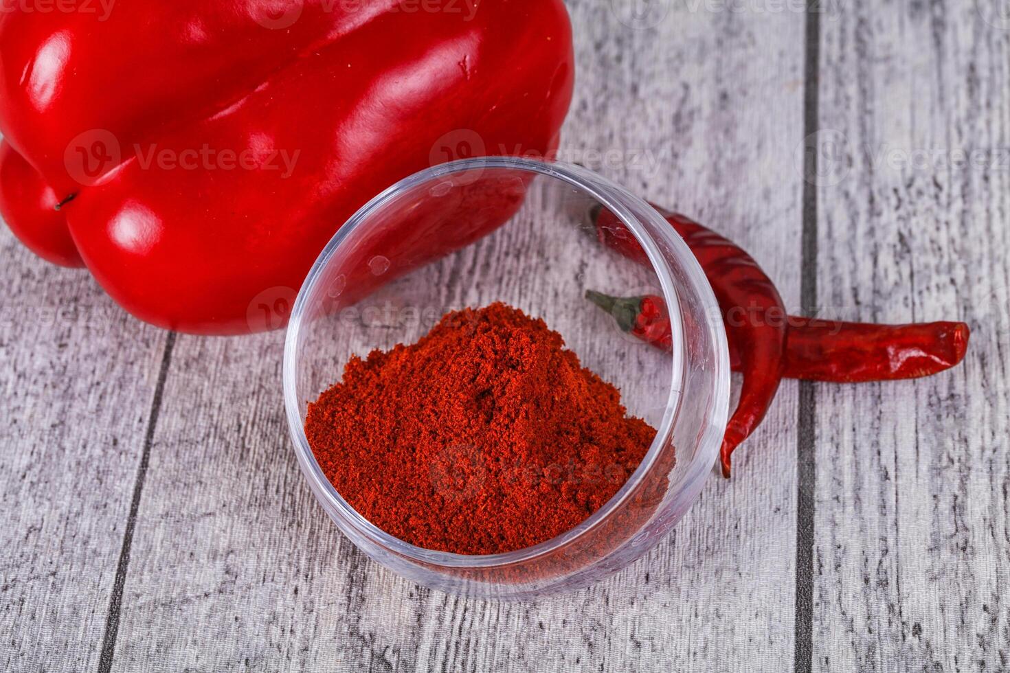 Paprika powder in the bowl photo