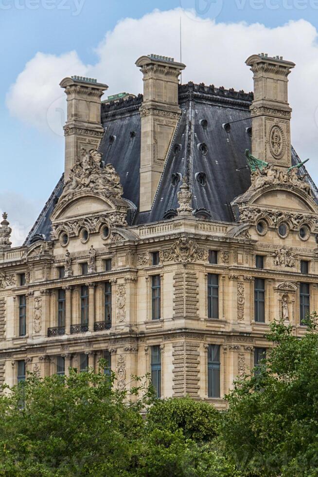 PARIS - JUNE 7 Louvre building on June 7, 2012 in Louvre Museum, Paris, France. With 8.5m annual visitors, Louvre is consistently the most visited museum worldwide. photo