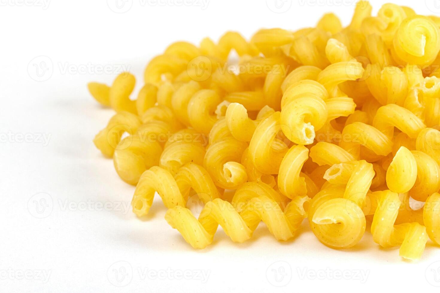 dried italian pasta on white background photo