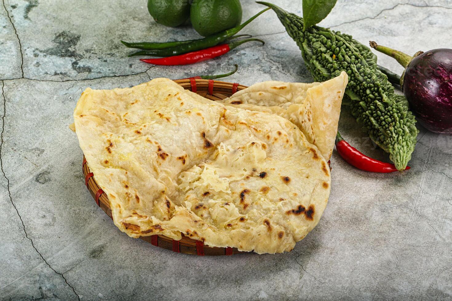 Indian tandori bread - naan with cheese photo