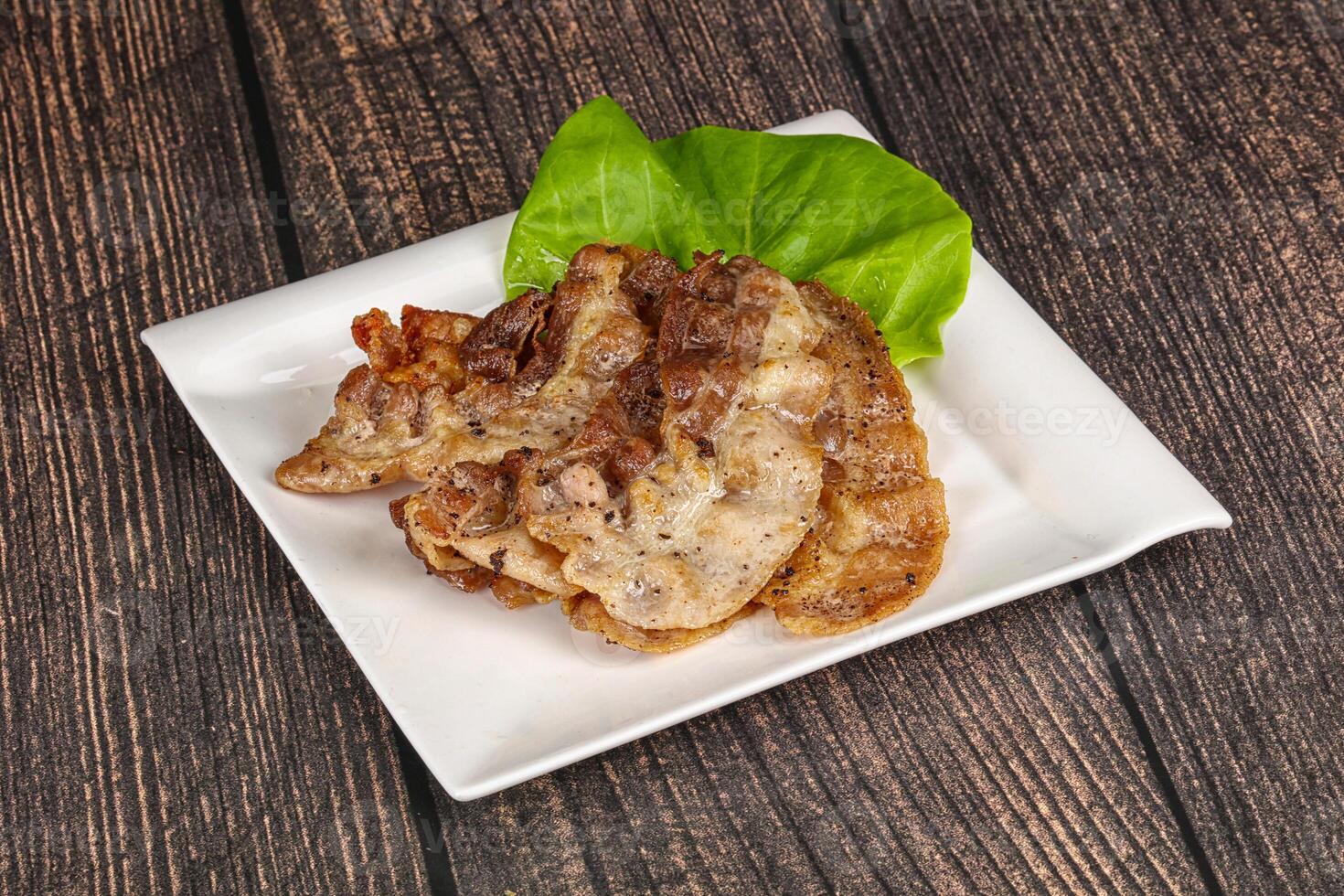 Roasted sliced pork fat bacon photo