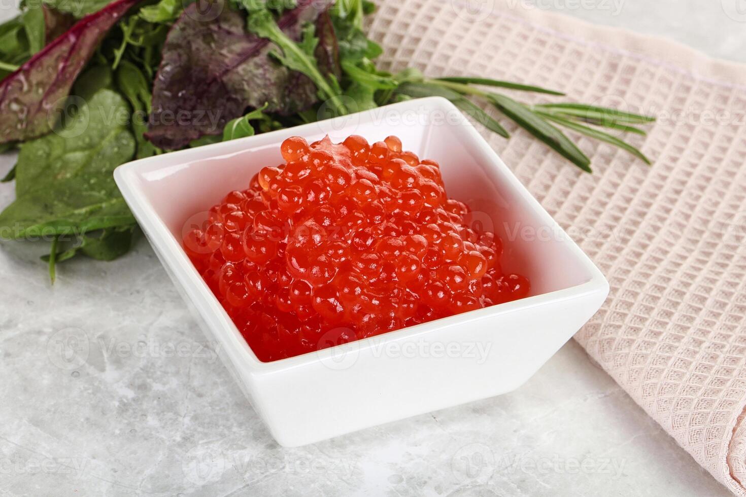 Red caviar in the bowl photo