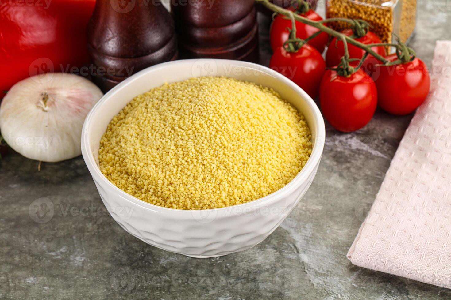 Raw dry wheat couscous grain photo