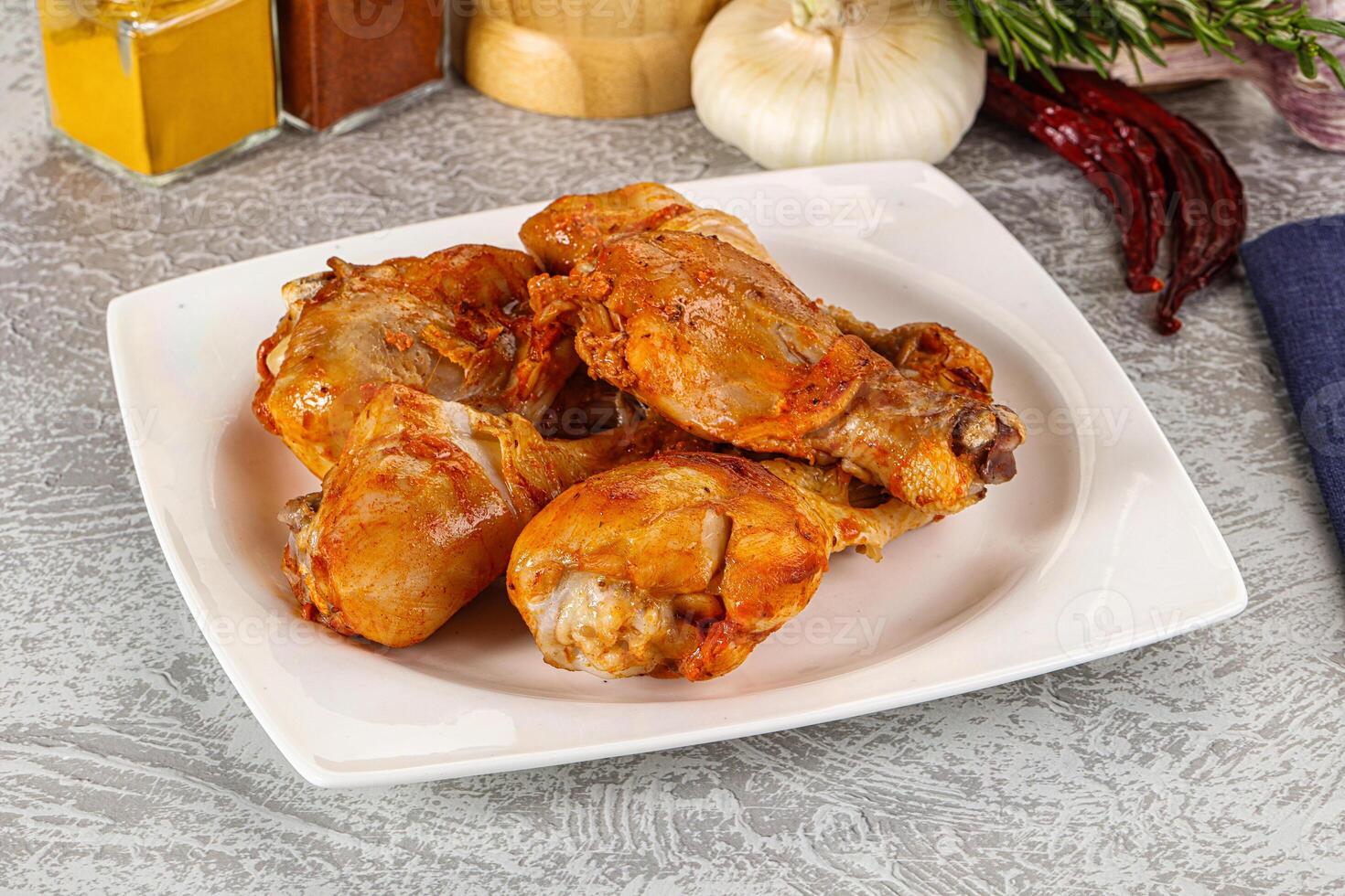 Raw marinated chicken drumstick for cooking photo