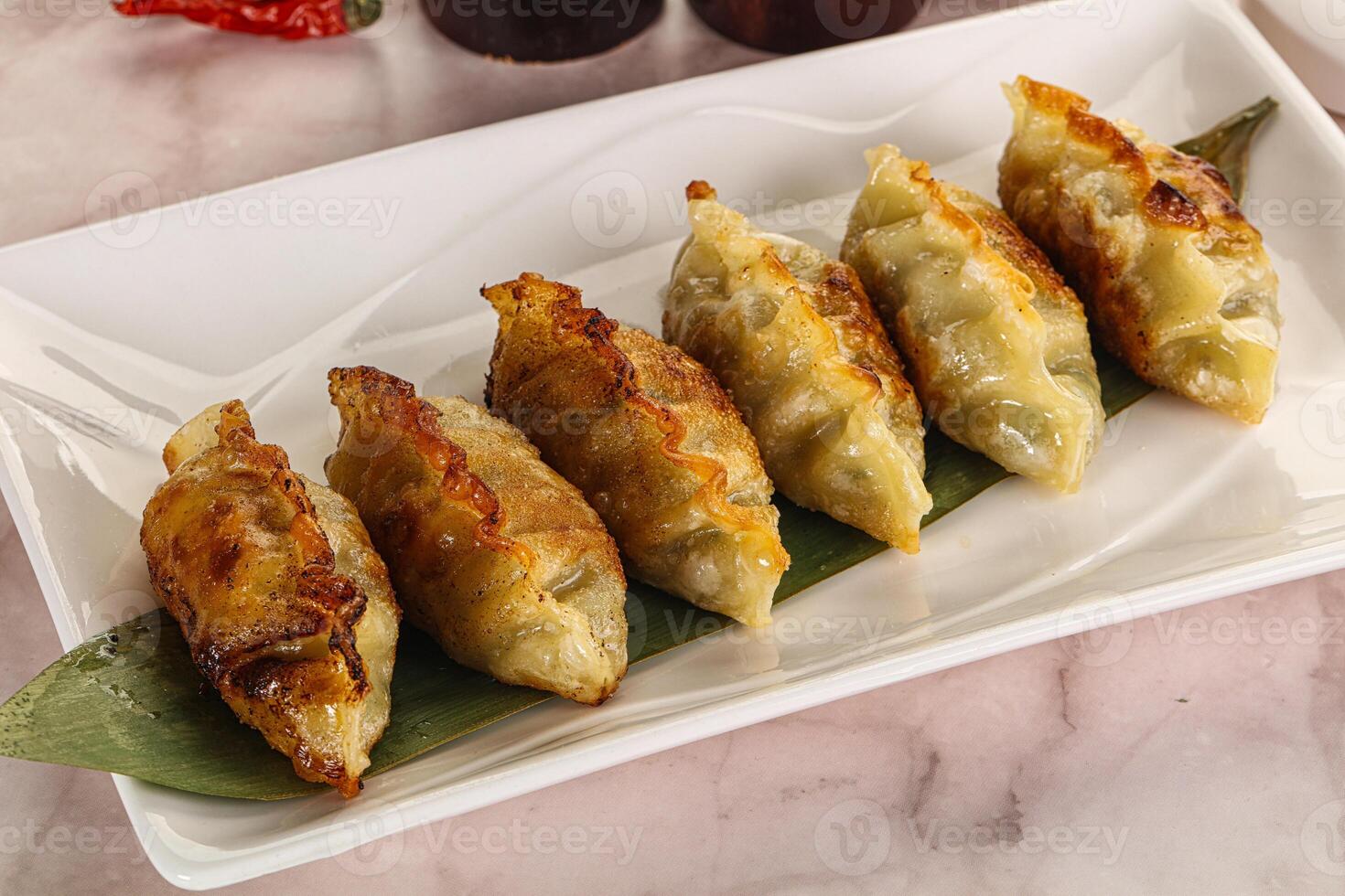 Fried Japanese stuffed dumplings - Gyoza photo