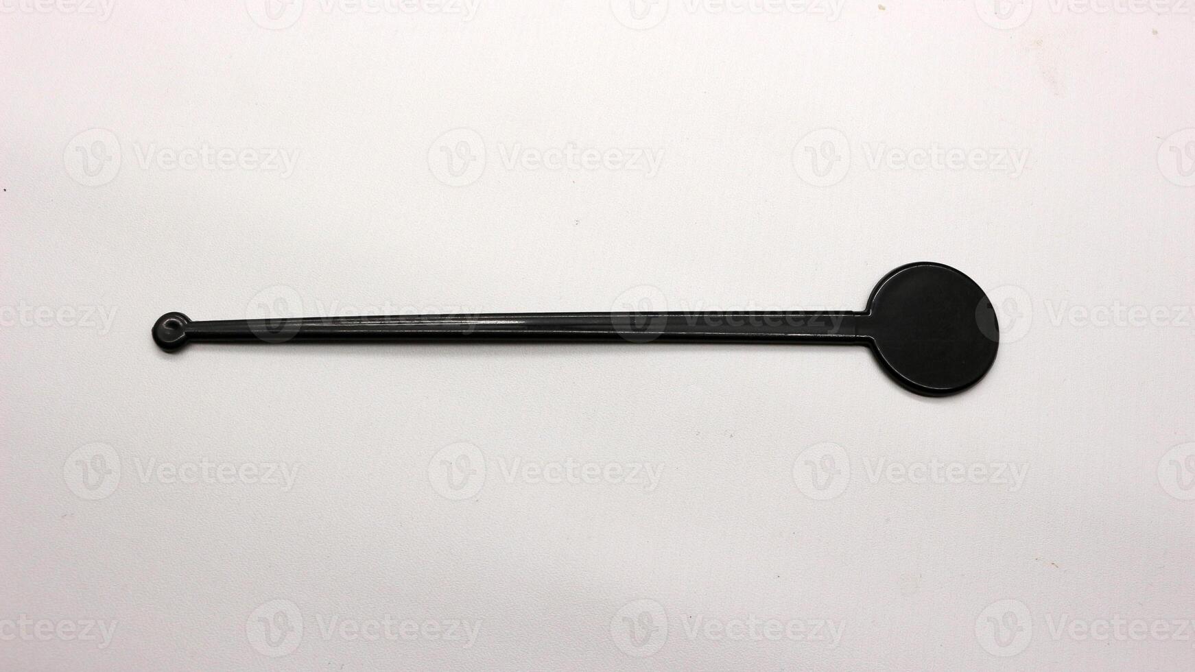 Cocktail stirrer isolated photo