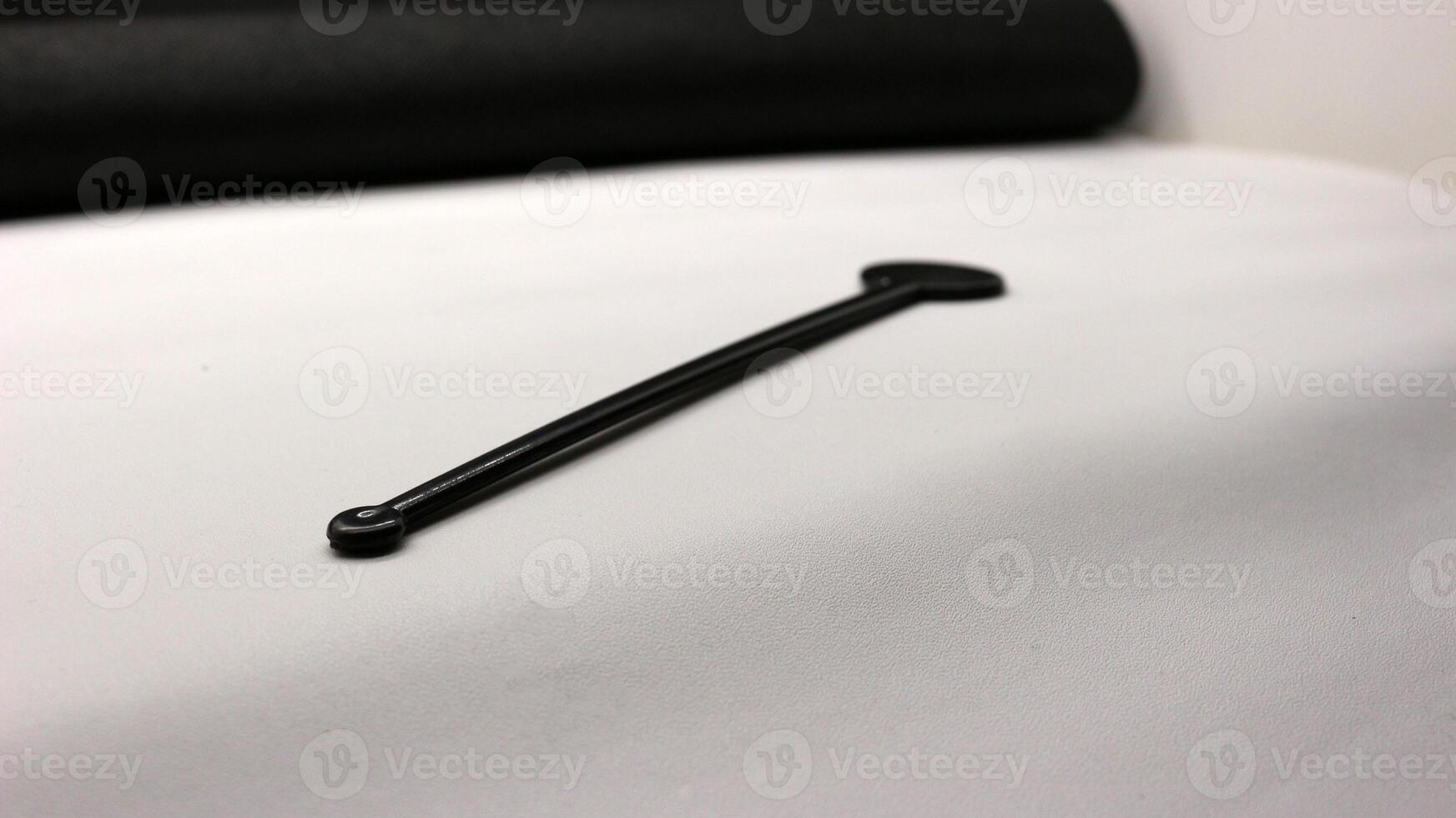 Cocktail stirrer isolated photo