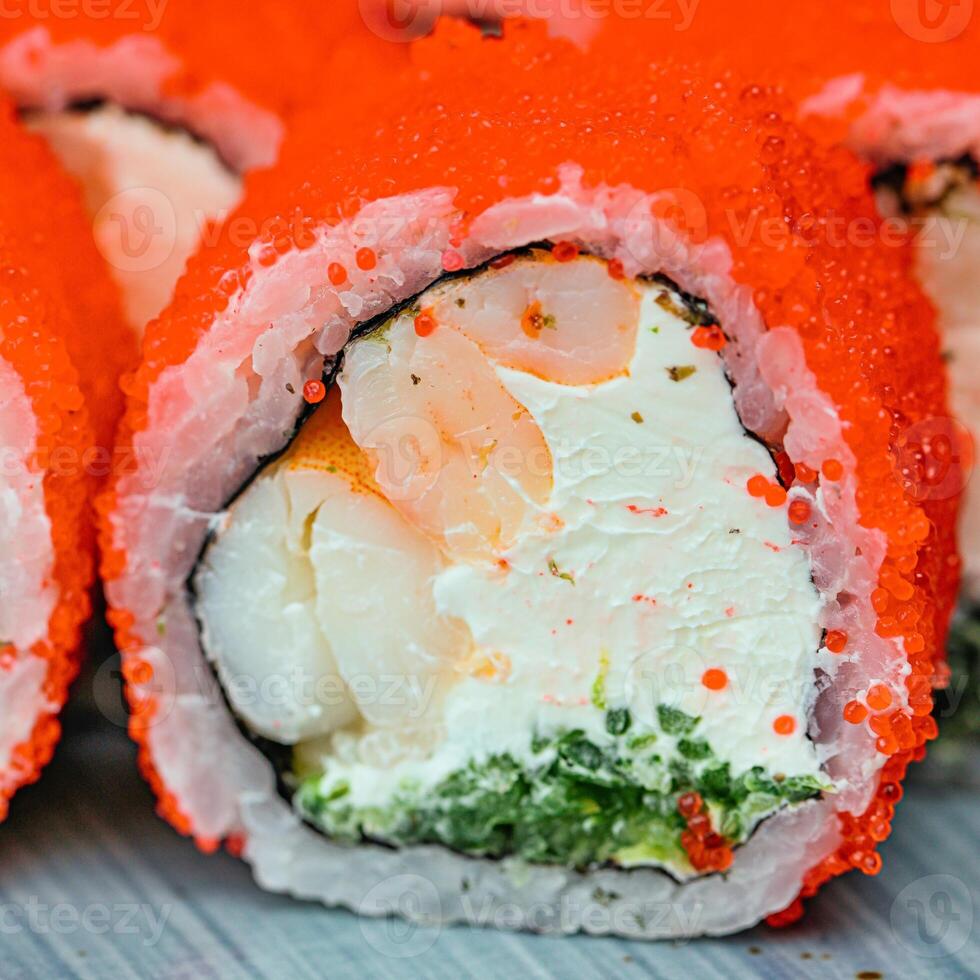 Close-Up of a Sushi Roll on a Table photo