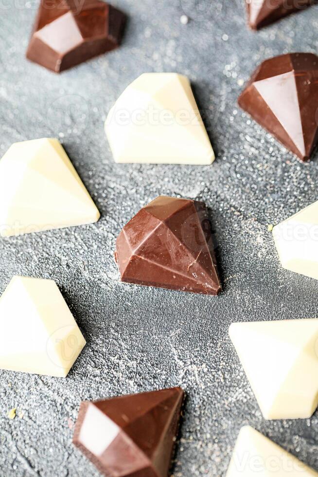 Close-Up of Assorted Chocolates on Table photo