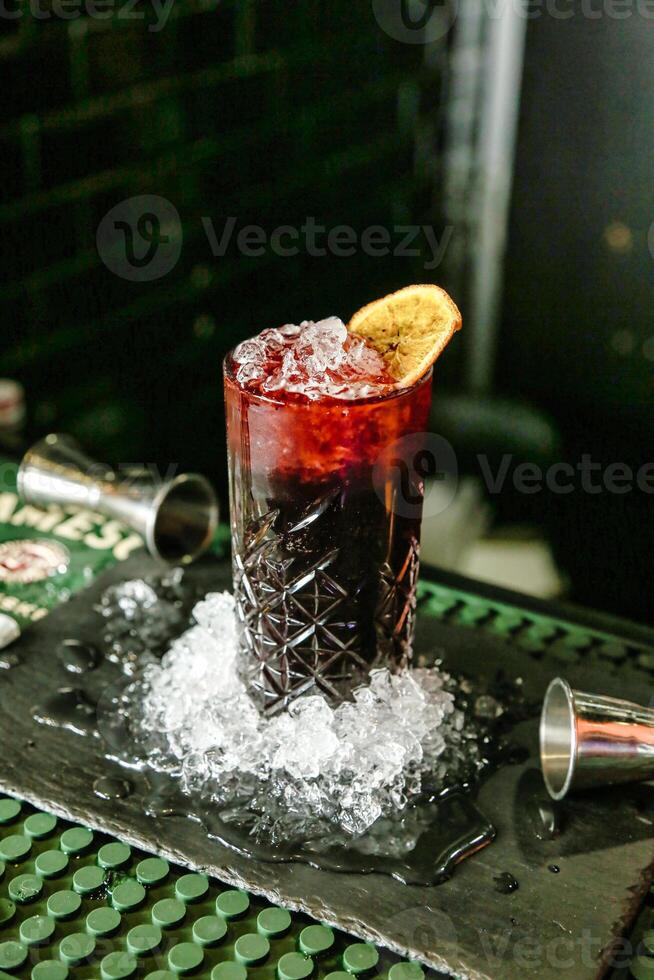 Close Up of a Drink on a Serving Tray photo