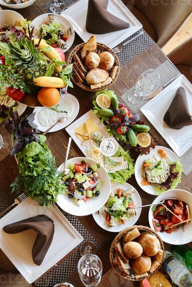 Abundance of Plates of Food on a Table photo