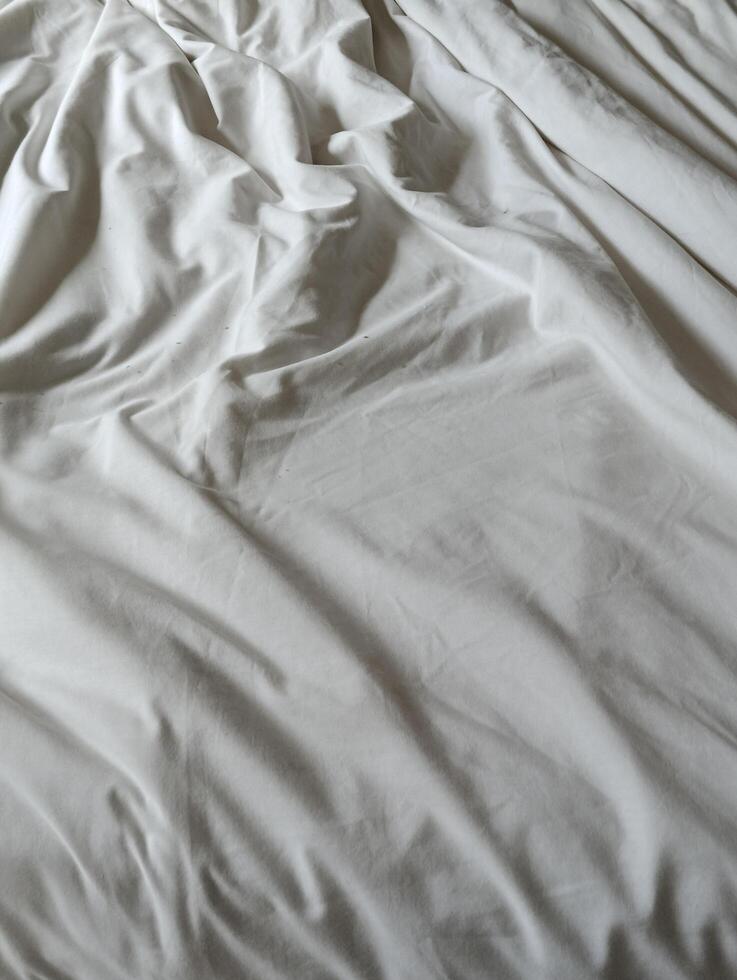 a bed sheets in hotels photo