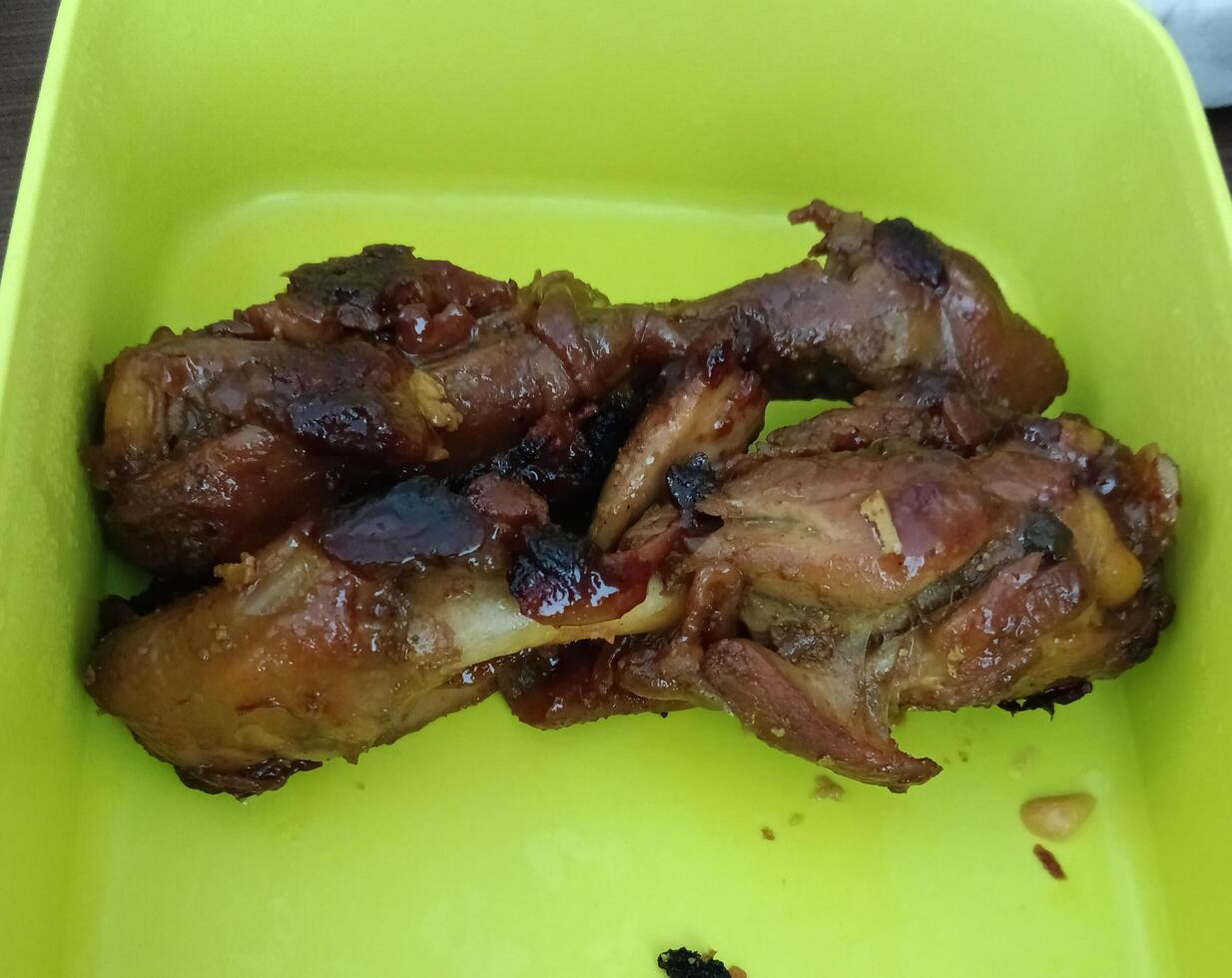 a close-up view of grilled chicken photo