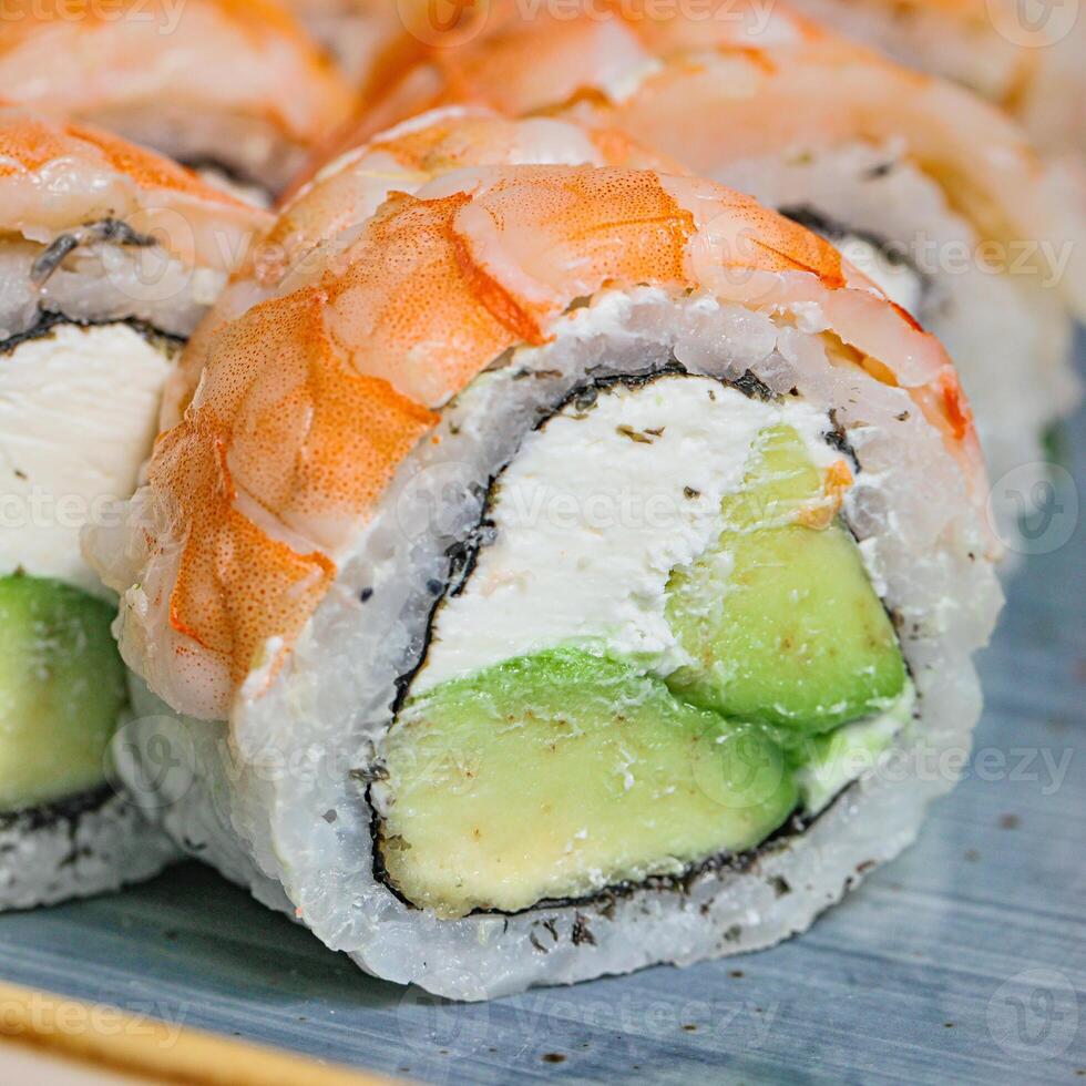 Close Up of Sushi Roll With Cucumbers photo