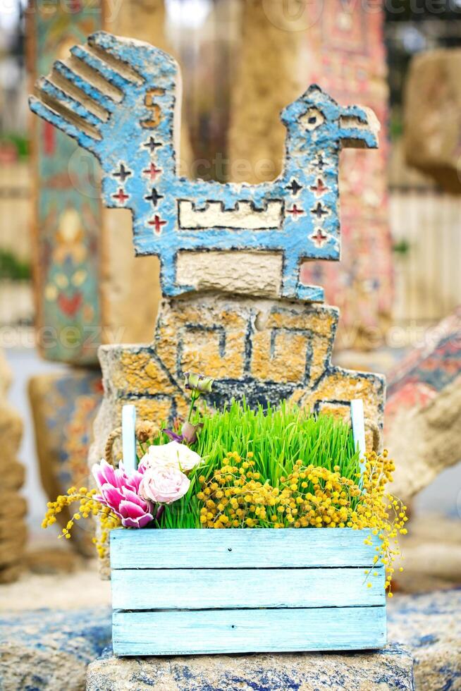 Wooden Box Filled With Grass and Flowers photo