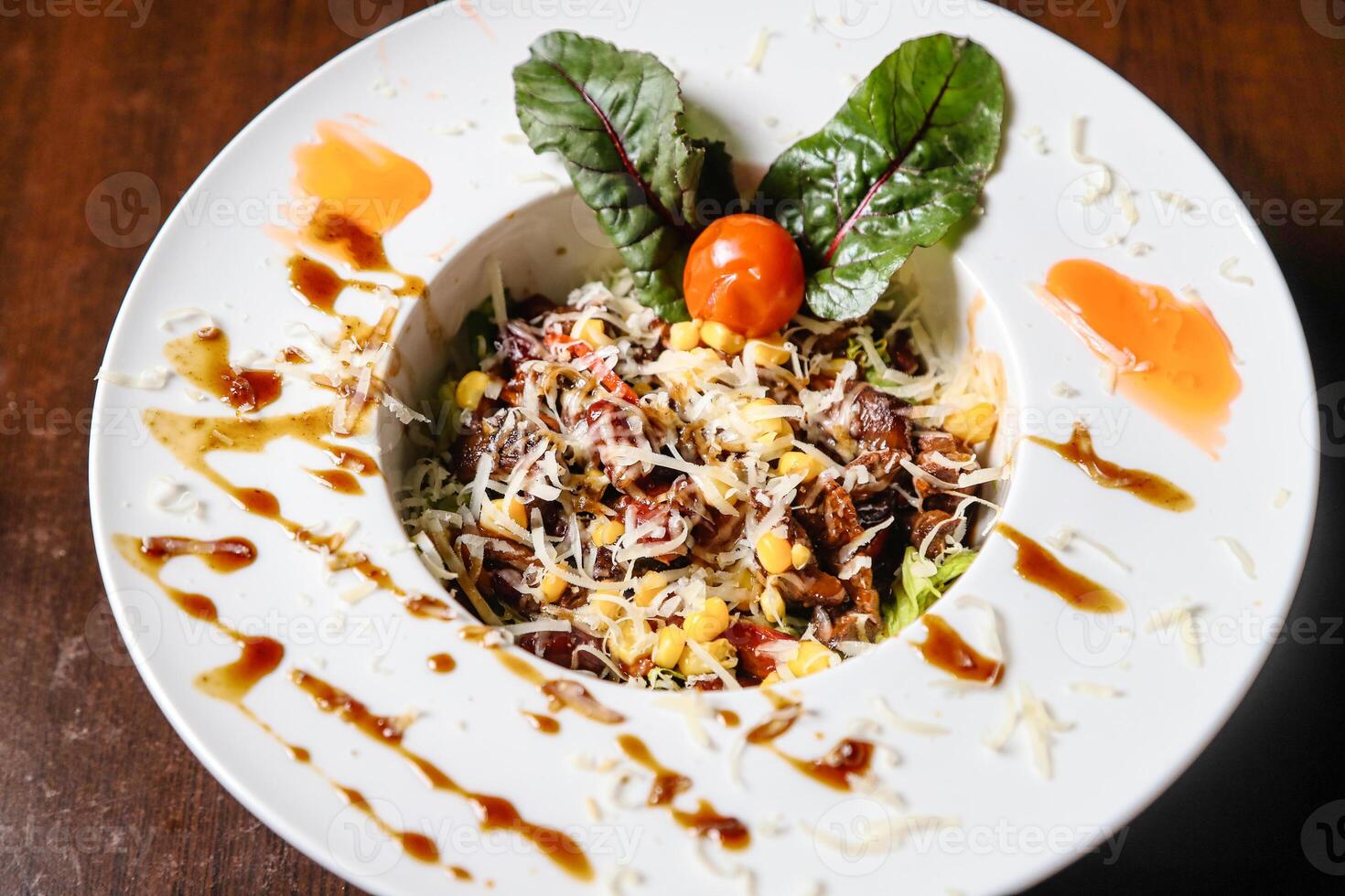 Plate of Food on Wooden Table photo