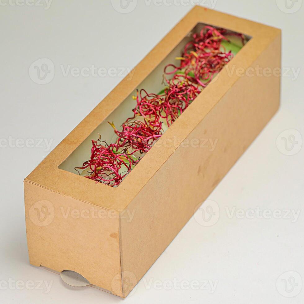 Wooden Box With Red String Inside photo