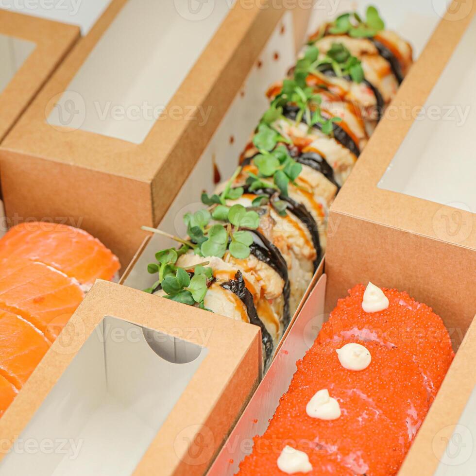 Sushi Roll in Box With Assorted Sushi photo