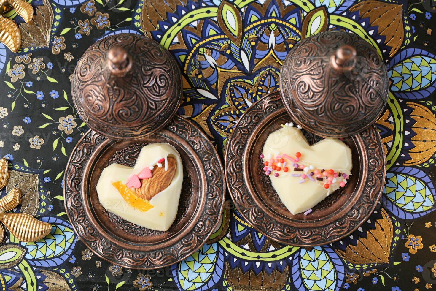 Two Heart Shaped Pastries on a Plate photo