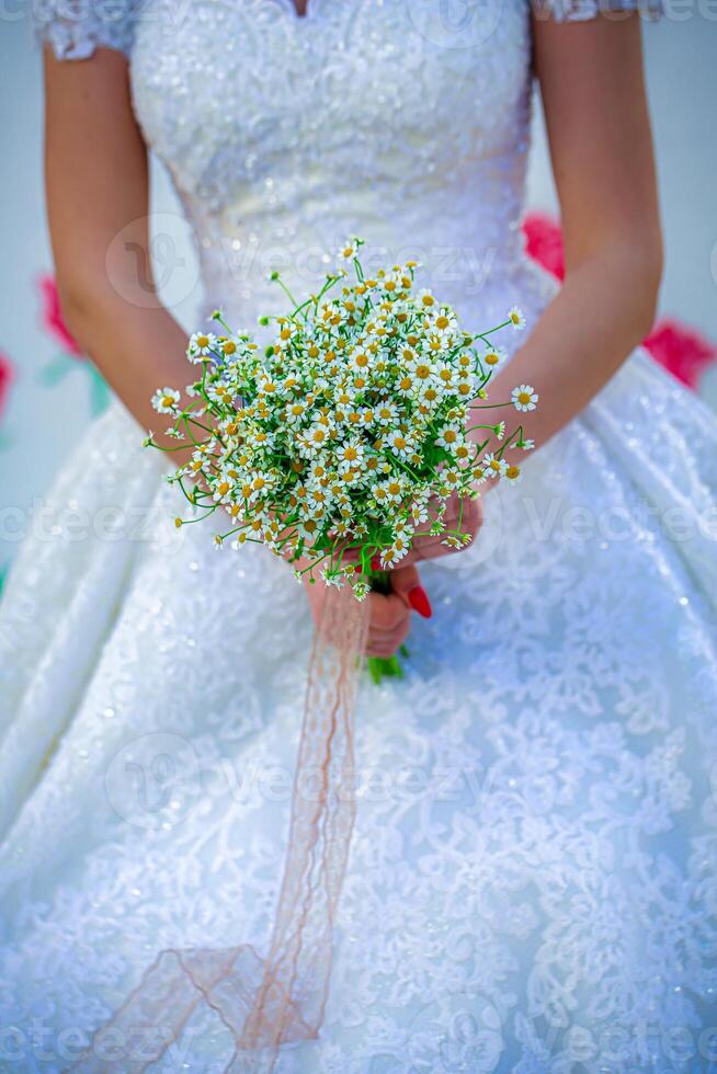 Bride Holding Wedding Bouquet photo