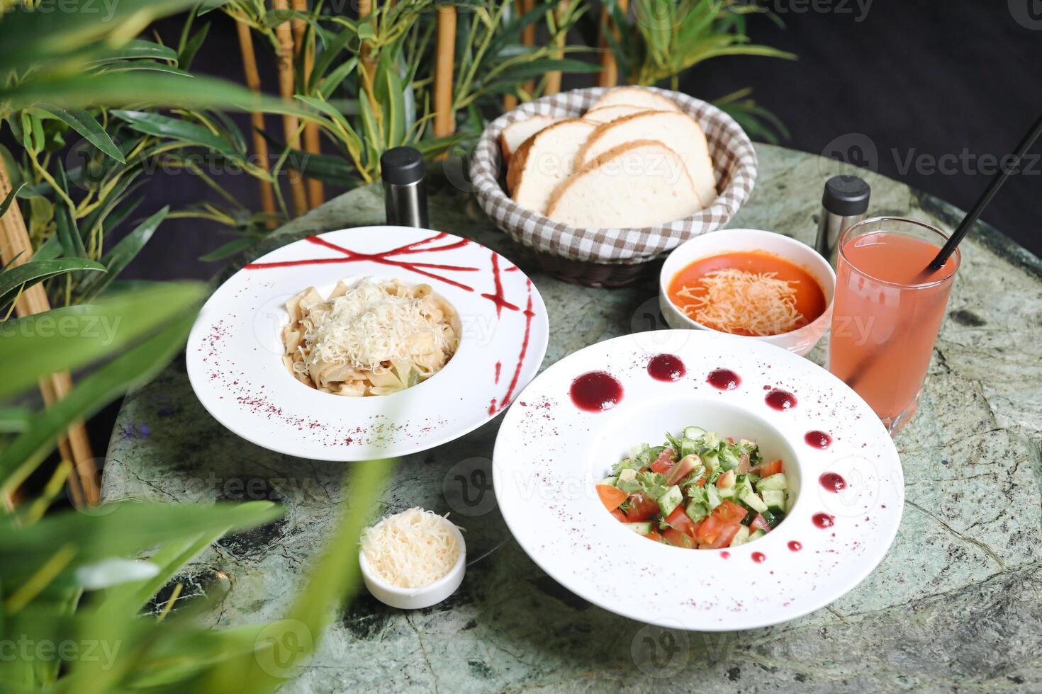 Table Set With Assorted Food and Drinks photo