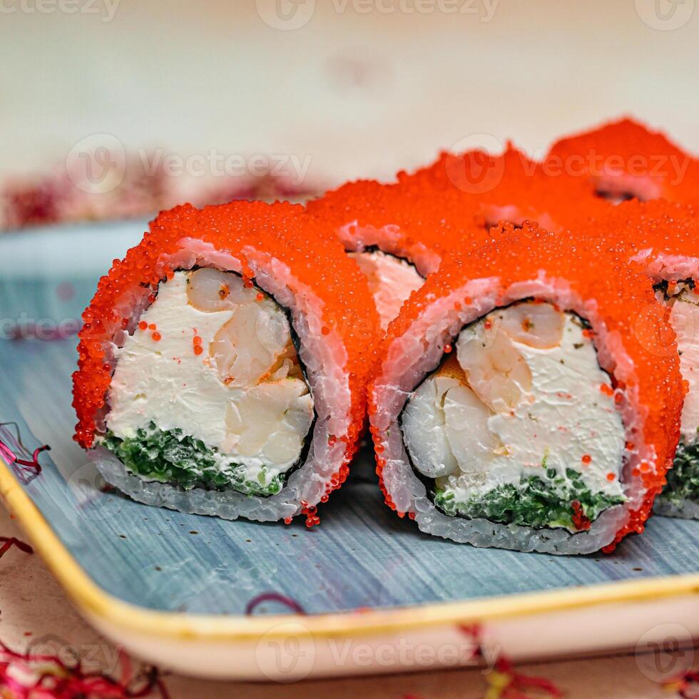 Close-up of Sushi Platter With Freshly Prepared Rolls and Assorted Seafood photo