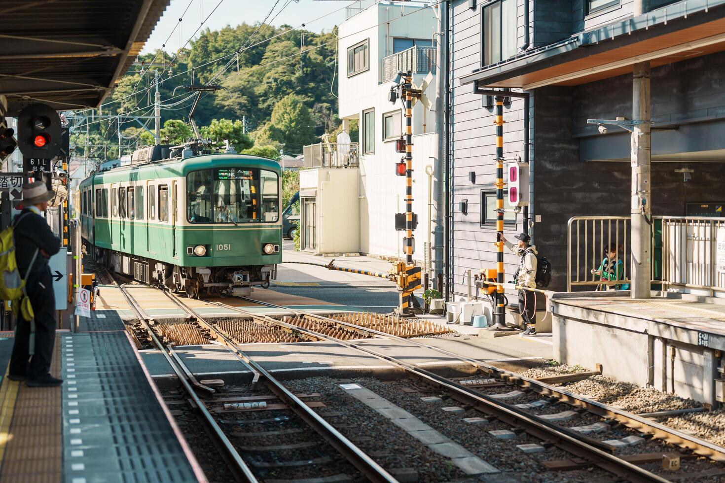 Enoshima Dentetsu train Line in Kamakura, Japanese railway connects Kamakura in Kamakura with Fujisawa Station in Fujisawa, Kanagawa. Landmark attraction near Tokyo. Kanagawa, Japan, 16 November 2023 photo