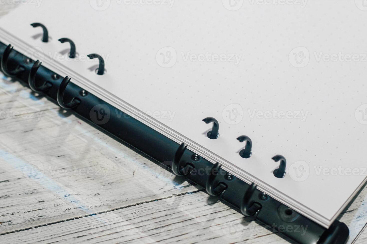 Notebook on rings, removable sheets in a box for keeping a diary. photo