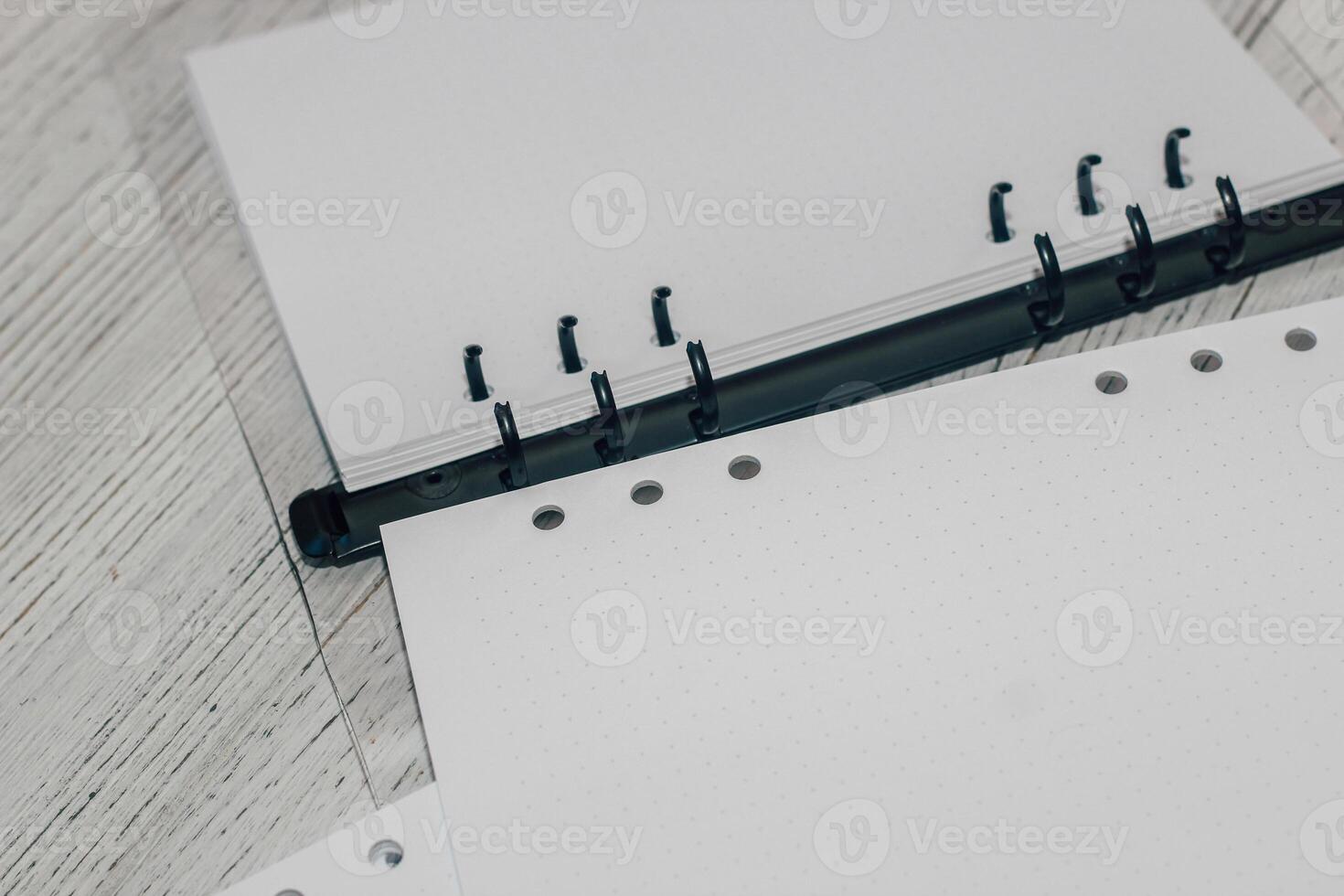 Notebook on rings, removable sheets in a box for keeping a diary. photo