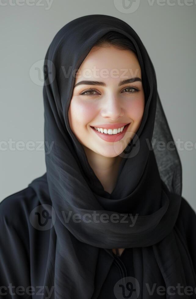 AI generated Business woman in black hijab smiling on white background, islamic traditional clothing concept photo