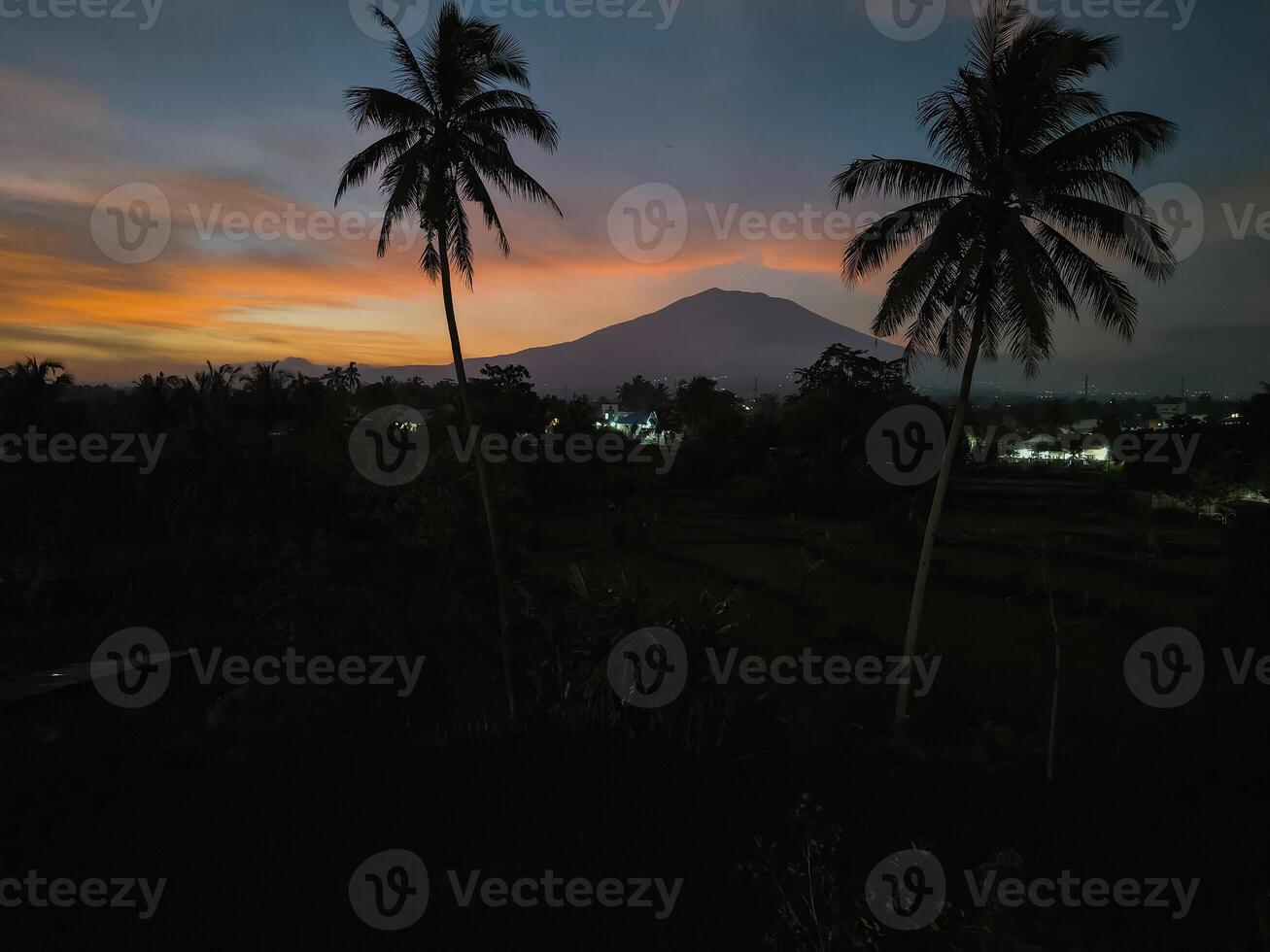 A view at dusk, when the sun is about to set photo