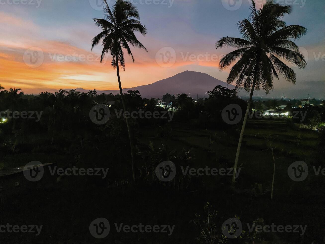 A view at dusk, when the sun is about to set photo