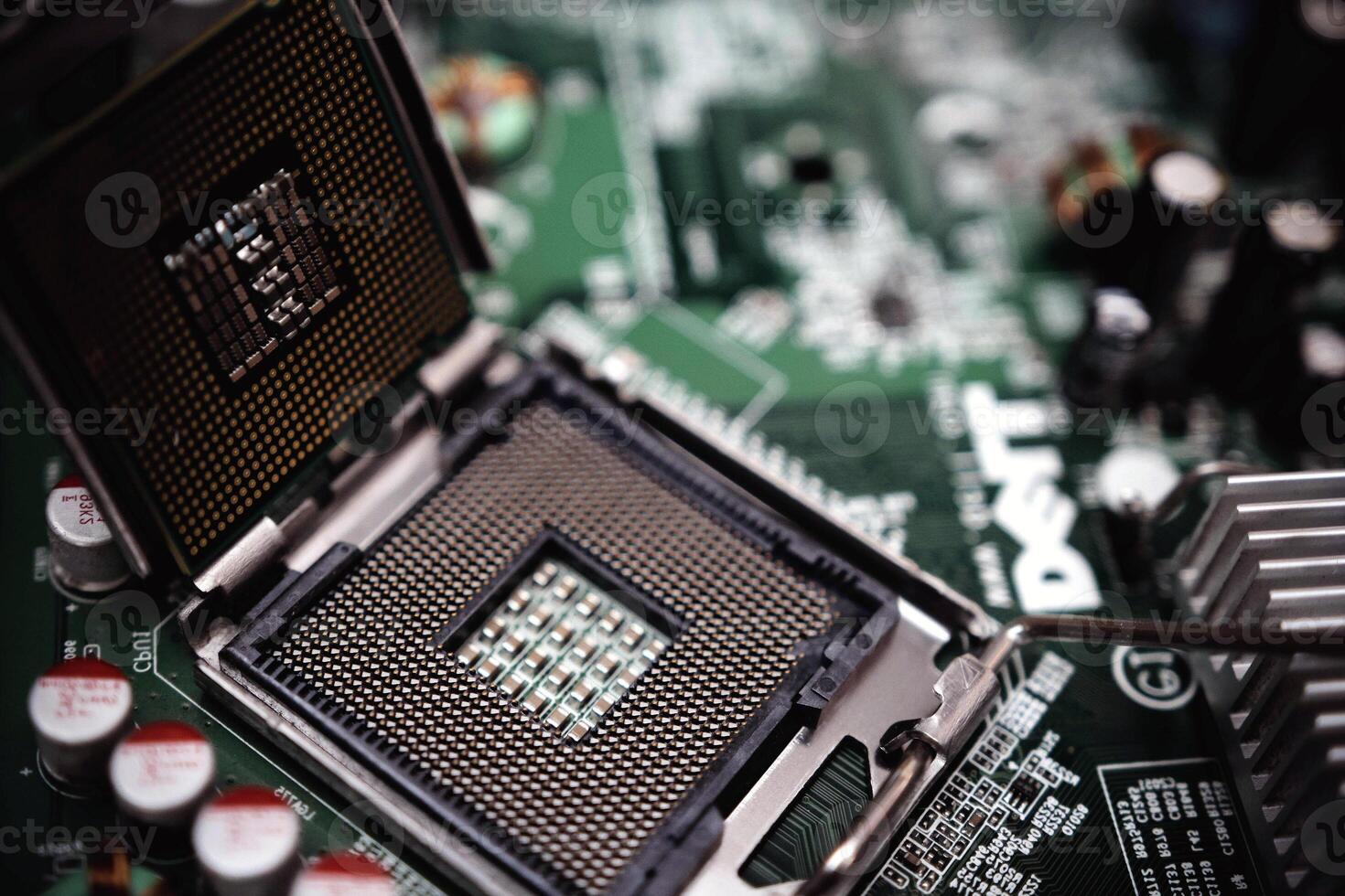 Comptuer processor and motherboard, microchip details close view. Hi-tech innovation background photo