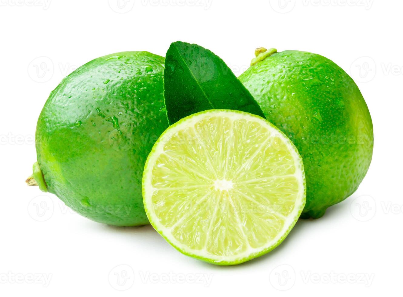 Front view of green lemon fruits with half and leaf isolated on white background with clipping path photo