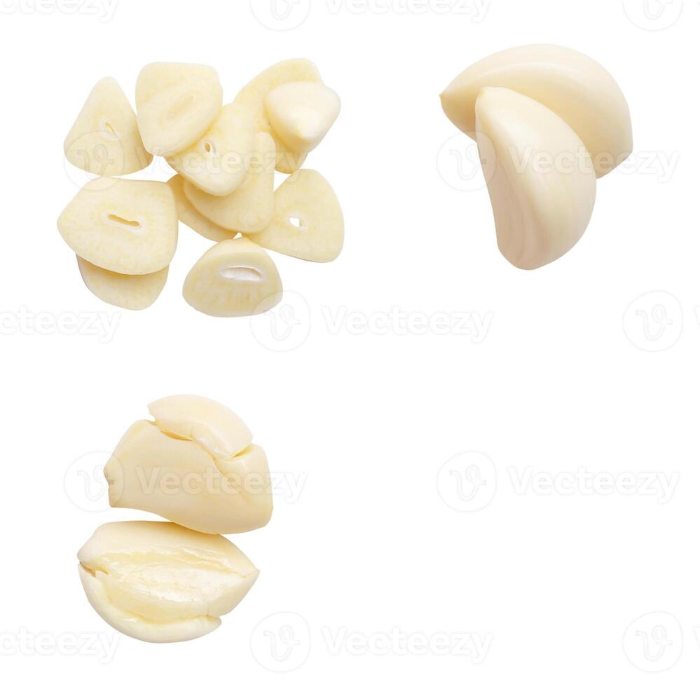 Top view set of garlic slices and pounded garlic cloves isolated on white background with clipping path photo