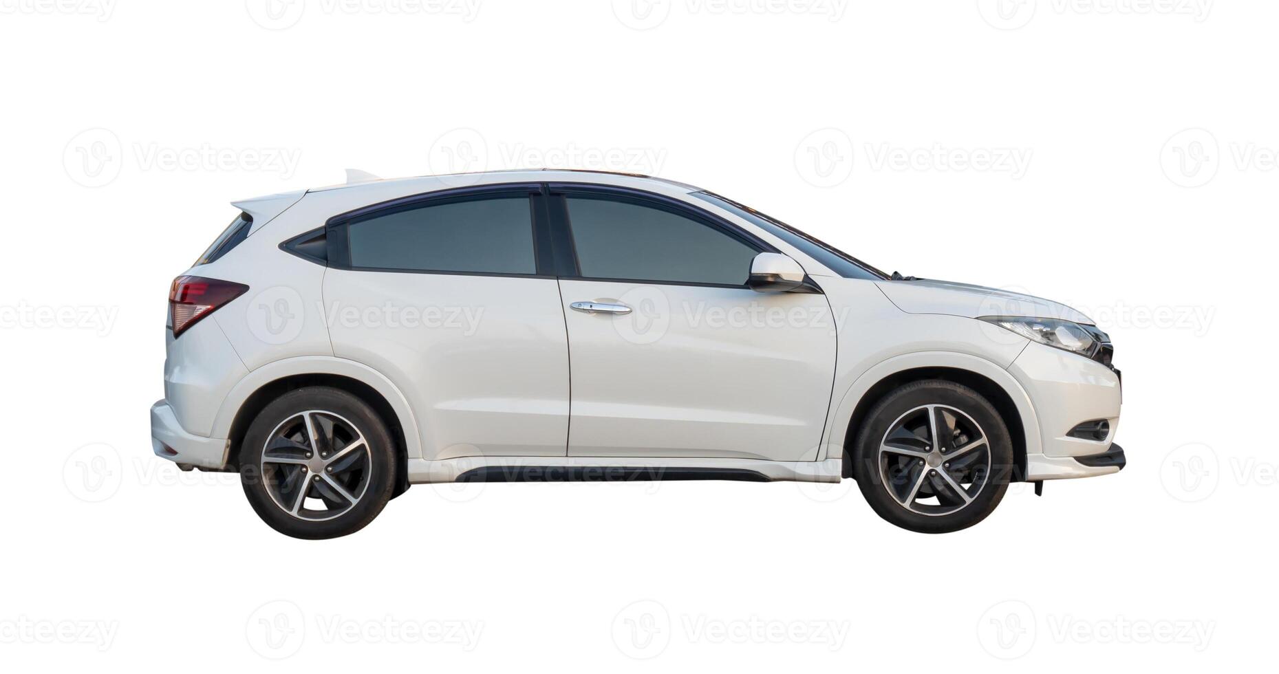 Side view of white hatchback car isolated on white background with clipping path photo