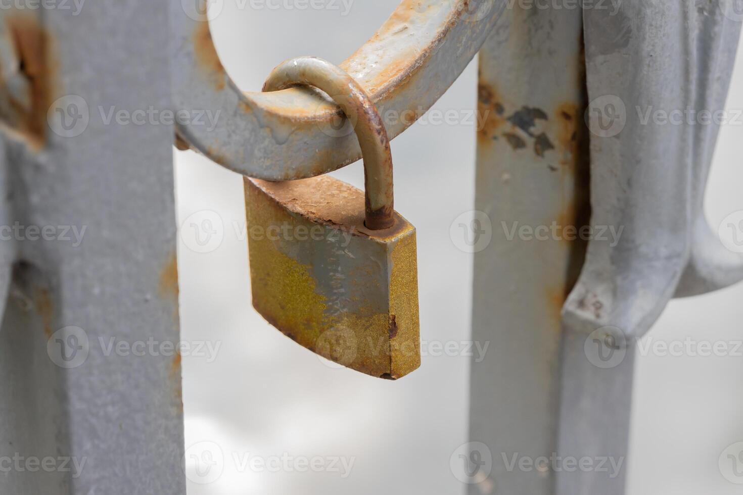 lock on the bridge. a fragment of the lattice of a bridge on which rusty wedding locks hang. High quality photo