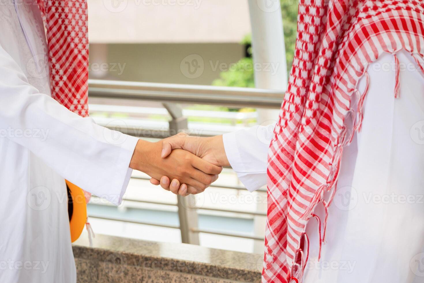 Arab Middle Eastern Businessman handshake, Business meeting with arab man and shaking hands in greetings photo