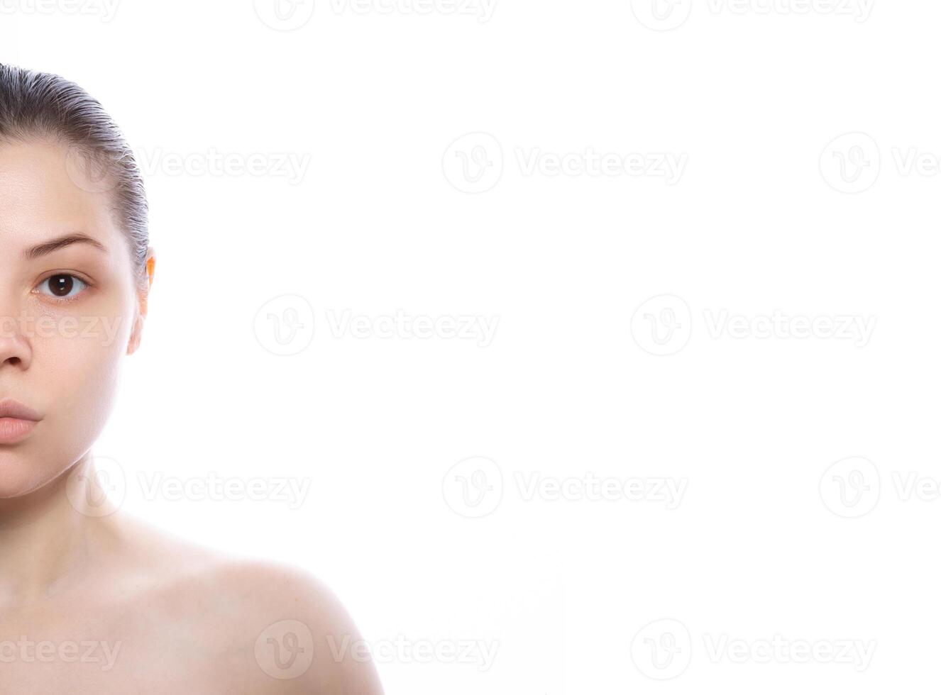 Beauty portrait of a young woman with flawless complexion and fresh clean skin in a cropped portrait with a white background. copy space. in concept of spa treatment. High quality photo
