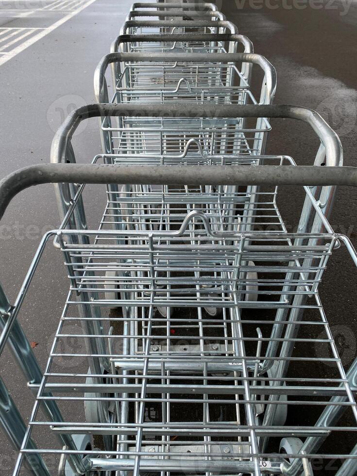 empty luggage carts in a row at the airport. selective focus.High quality photo
