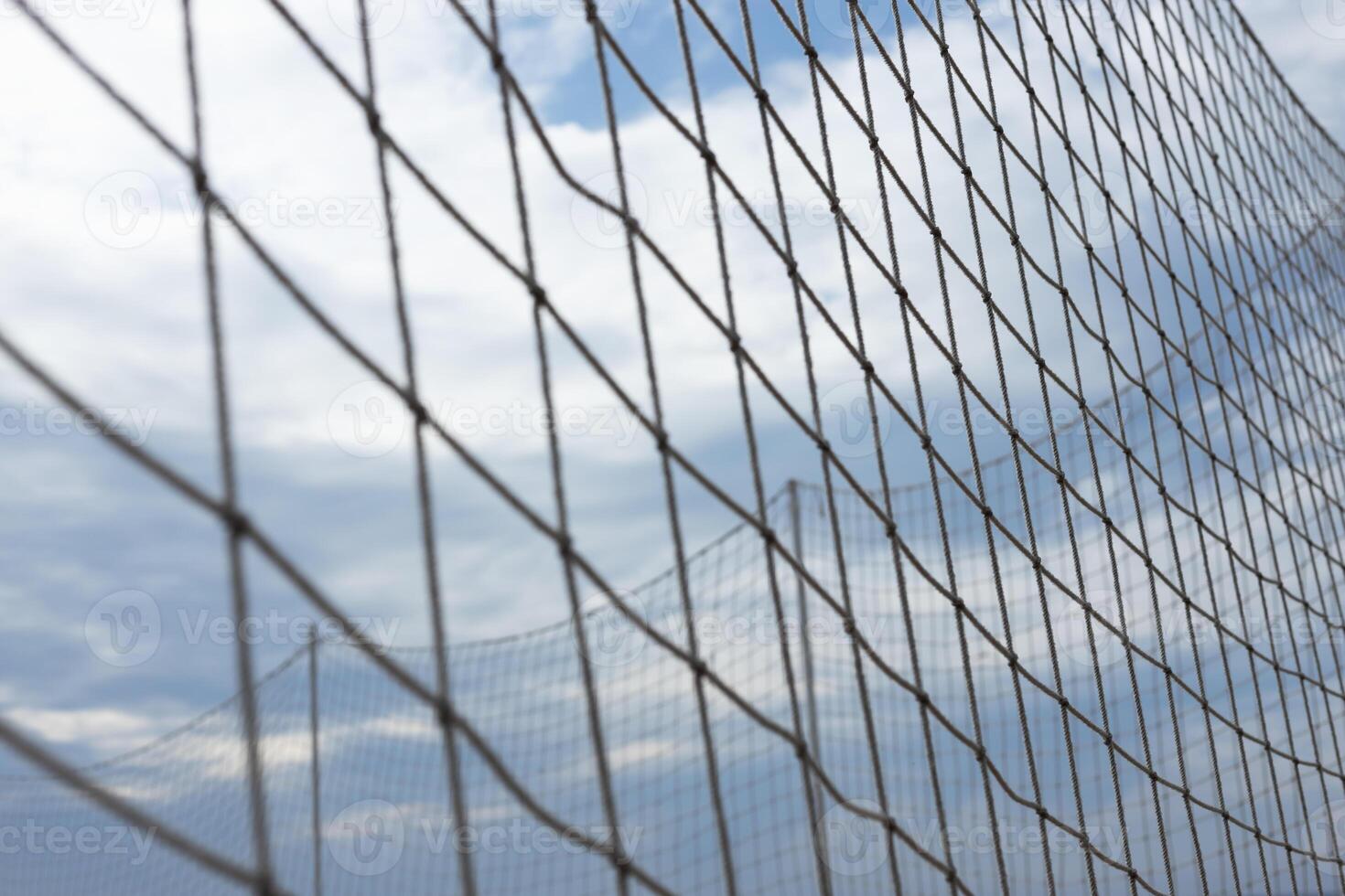 Volleyball net with blue sky for background design. High quality photo