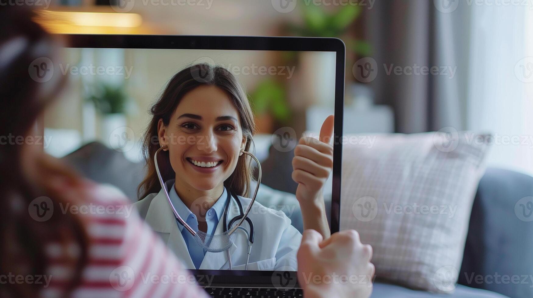 AI generated A heartwarming close-up of a patient's relieved and joyful expression on a doctor's laptop screen during a video call. The doctor's hands are seen giving a thumbs-up to the patient photo