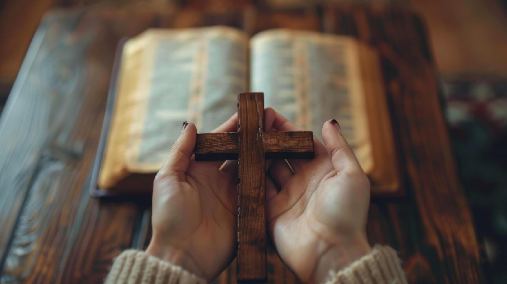 AI generated A woman who believes in a higher power is pictured holding a wooden cross on an open holy bible photo